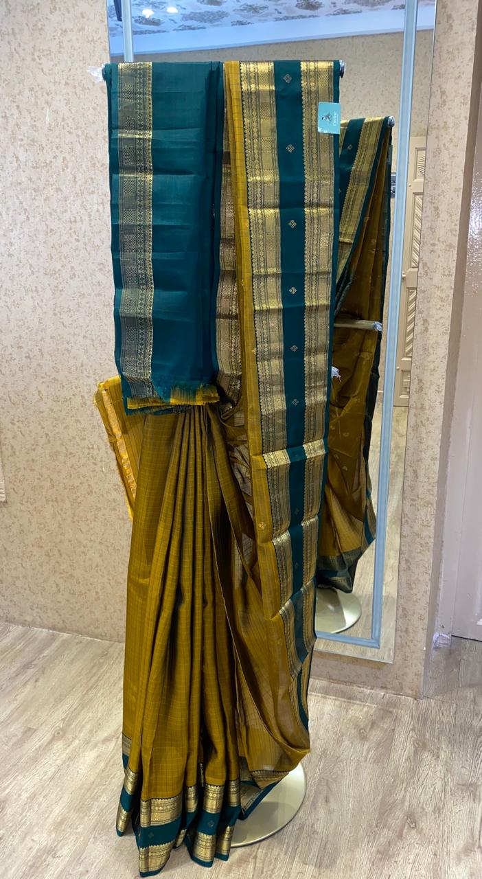 Mustard yellow with Peacock Green Kanchipuram Silk Saree With Retta Patta Border
